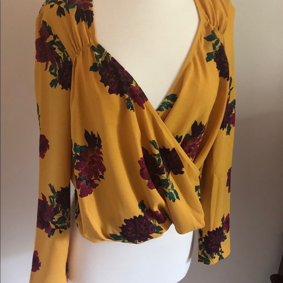 free press Tops - NWT free press long sleeve wrap top. Size S